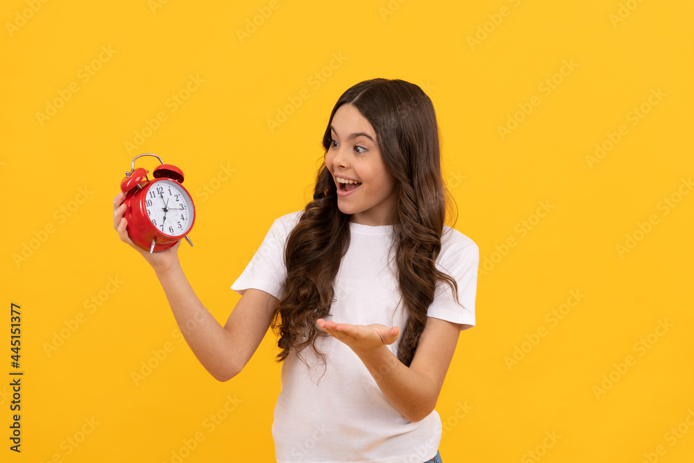 happy child hold retro alarm clock showing time, morning happy child hold retro alarm clock showing time, morning