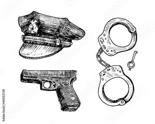 Vintage American police officer hat,gun,handcuffs and key