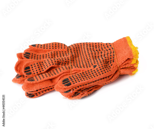 textile orange work gloves on a white background. Protective clothing for manual workers