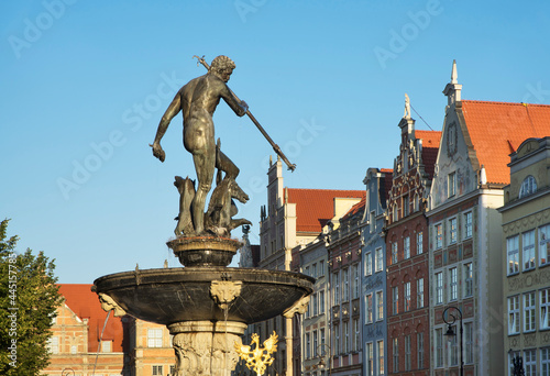 Neptune fountain and townhouse at Dluga (Long) street in Gdansk. Poland