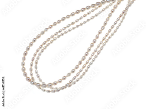 Lines of baroque pearls isolated on white background