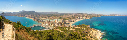 Aerial panorama of the Costa Blanca. Panoramic view of Calpe from famous rock - Penon de Ifach, overlooking the coast, the harbor, lake and the city..