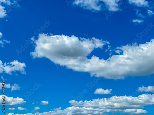 Blue sky with clouds. Close up. © Aleksey