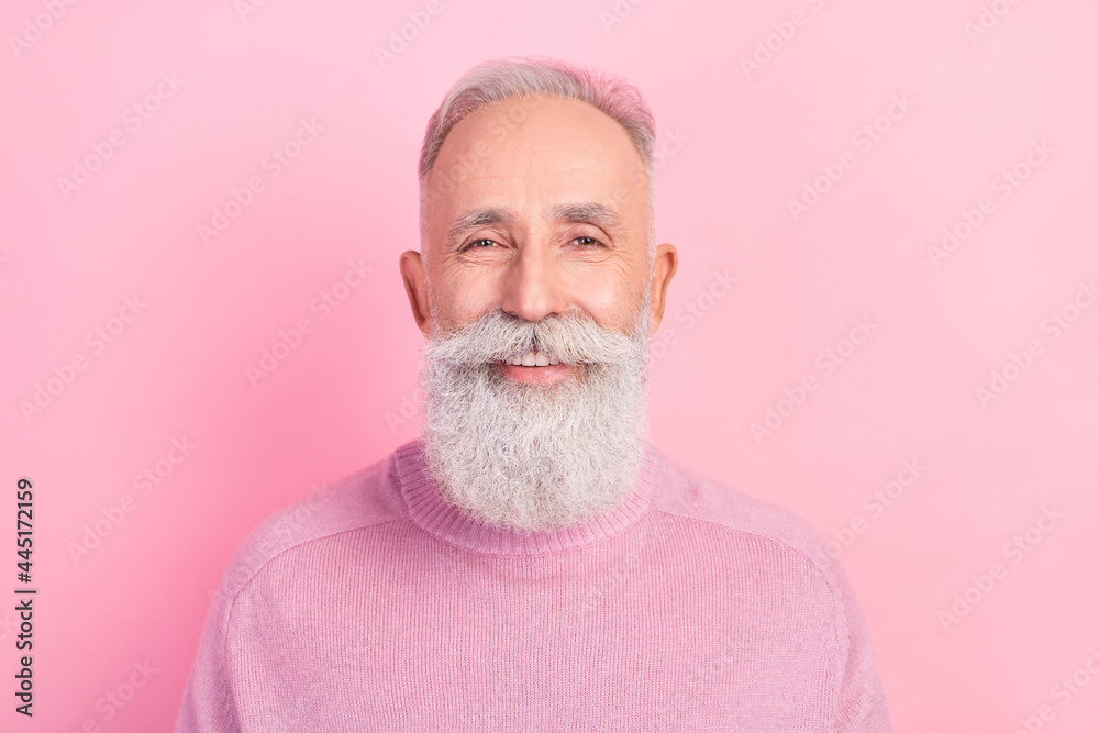 Photo of cheerful grey hair senior man wear pink sweater isolated on pastel color background Photo of cheerful grey hair senior man wear pink sweater isolated on pastel color background