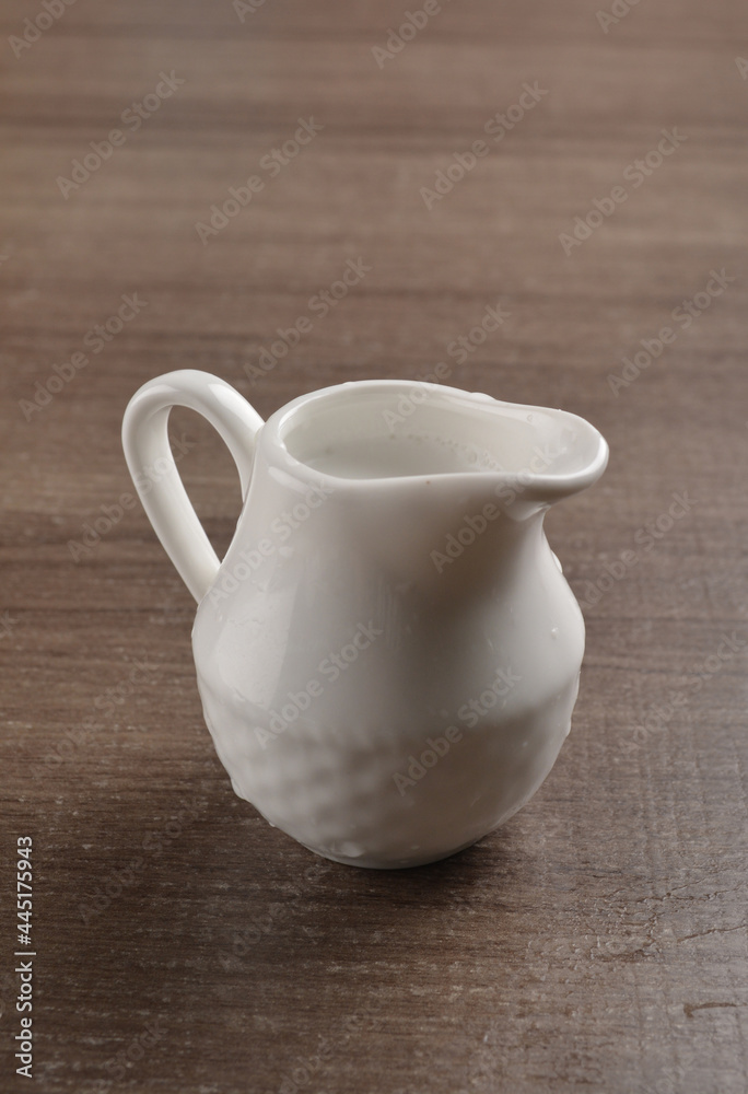 fresh milk in white glass on wood background asian dessert menu fresh milk in white glass on wood background asian dessert menu
