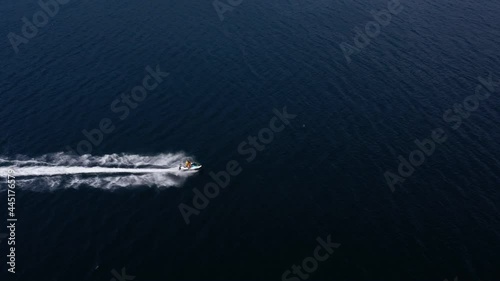 Wallpaper Mural Aerial drone tracking footage of jet ski speeding over the sea. Super fast travel, leisure summer holidays activities, water transportation. Torontodigital.ca