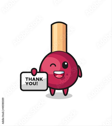 the mascot of the matches holding a banner that says thank you