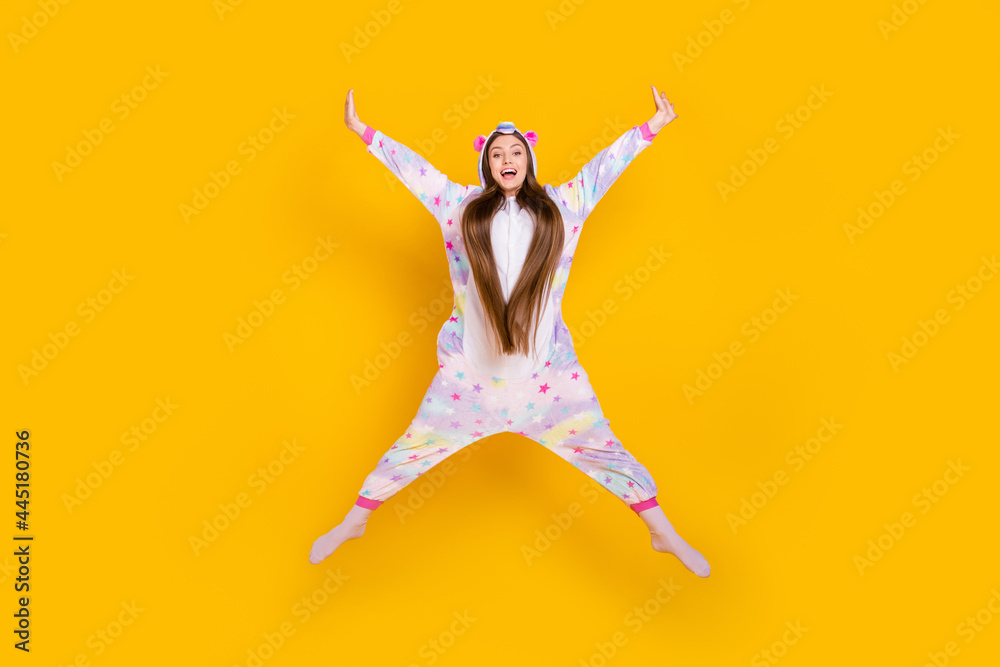 Full length body size view of pretty cheerful carefree girl jumping having fun wear animal look isolated over bright yellow color background
