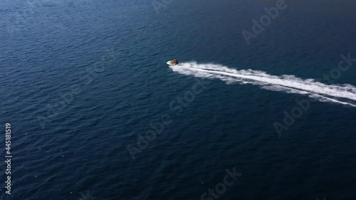 Wallpaper Mural Aerial drone tracking footage of jet ski speeding over the sea. Super fast travel, leisure summer holidays activities, water transportation. Torontodigital.ca