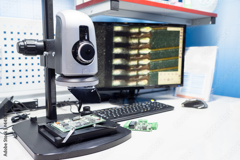Microprocessor with transistors on electron microscope. Electron