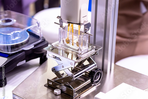 Vibro viscometer in laboratory. Medical equipment for analysis of viscosity. Device laboratory for analyzing viscosity in liquid. Fragment vibro viscometer close-up. Equipment for production drugs