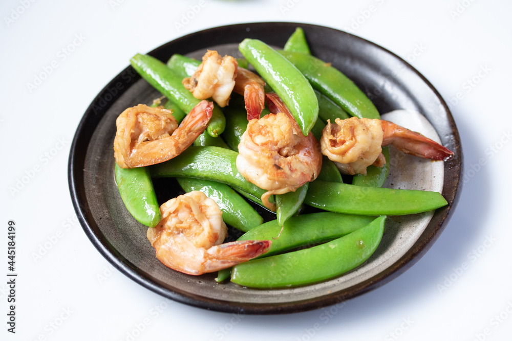 Shrimp stir and fried and green peas