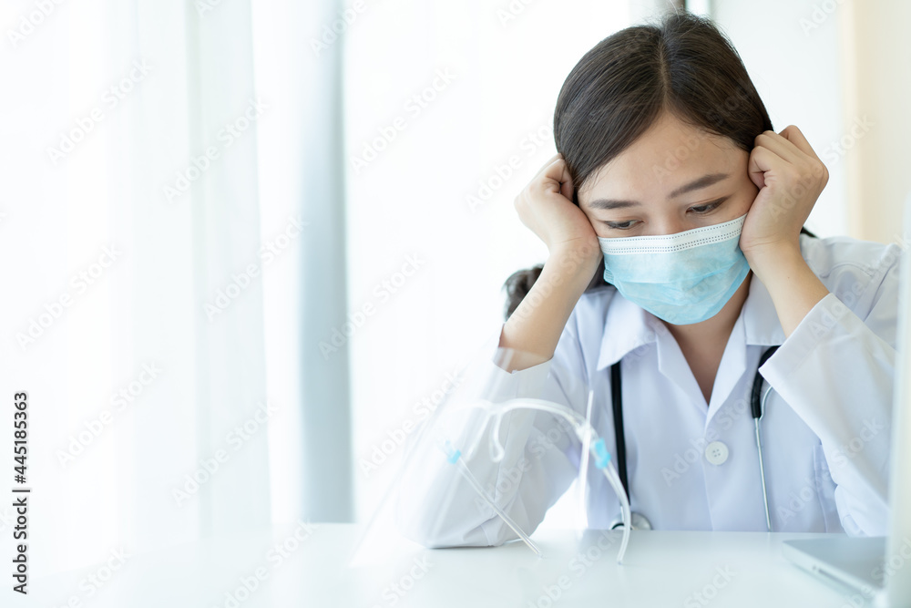 Hard working of Asian young female doctor in hospital, stressful - workaholic health care worker. Hard working of Asian young female doctor in hospital, stressful - workaholic health care worker.