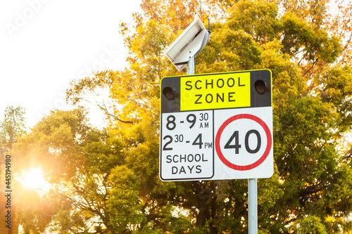 School zone sign on autumn day photo