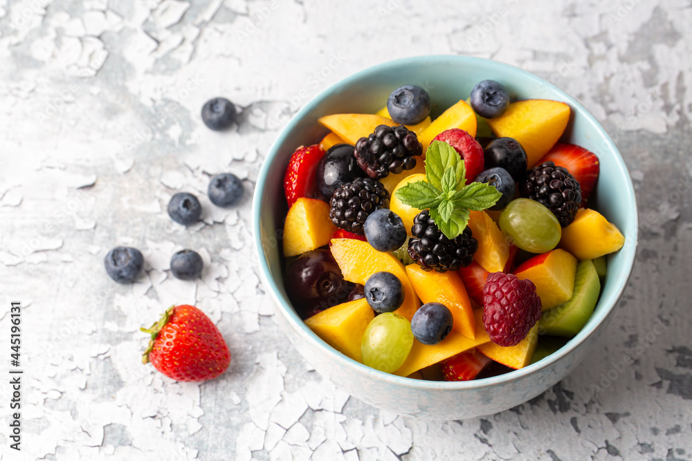 Dietary fruit salad with fresh summer fruits Dietary fruit salad with fresh summer fruits