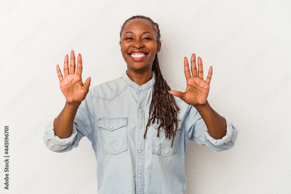 Young african american woman isolated on white background showing number ten with hands. Young african american woman isolated on white background showing number ten with hands.