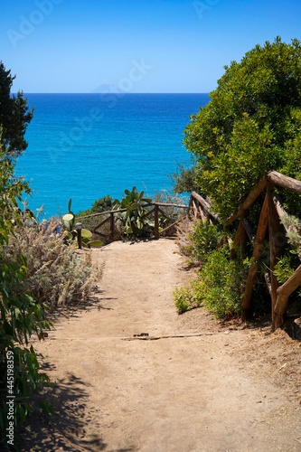 turquoise Tyrrhenian Sea and Stromboli volcanic island seen from the viewpoint of Sanctuary of Santa Maria dell'Isola in Tropea, Calabria, Italy