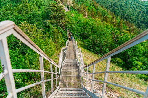 Stairs in the forest in the mountains. Beautiful natural landscape of Russia near the Volga River.