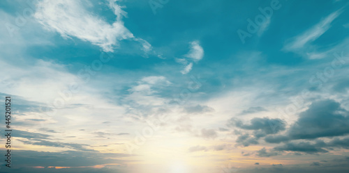 Fototapeta Naklejka Na Ścianę i Meble -  Summer Blue Sky and white cloud white background. Beautiful clear cloudy in sunlight calm season. Panoramic vivid cyan cloudscape in nature environment. Outdoor horizon skyline with spring sunshine.