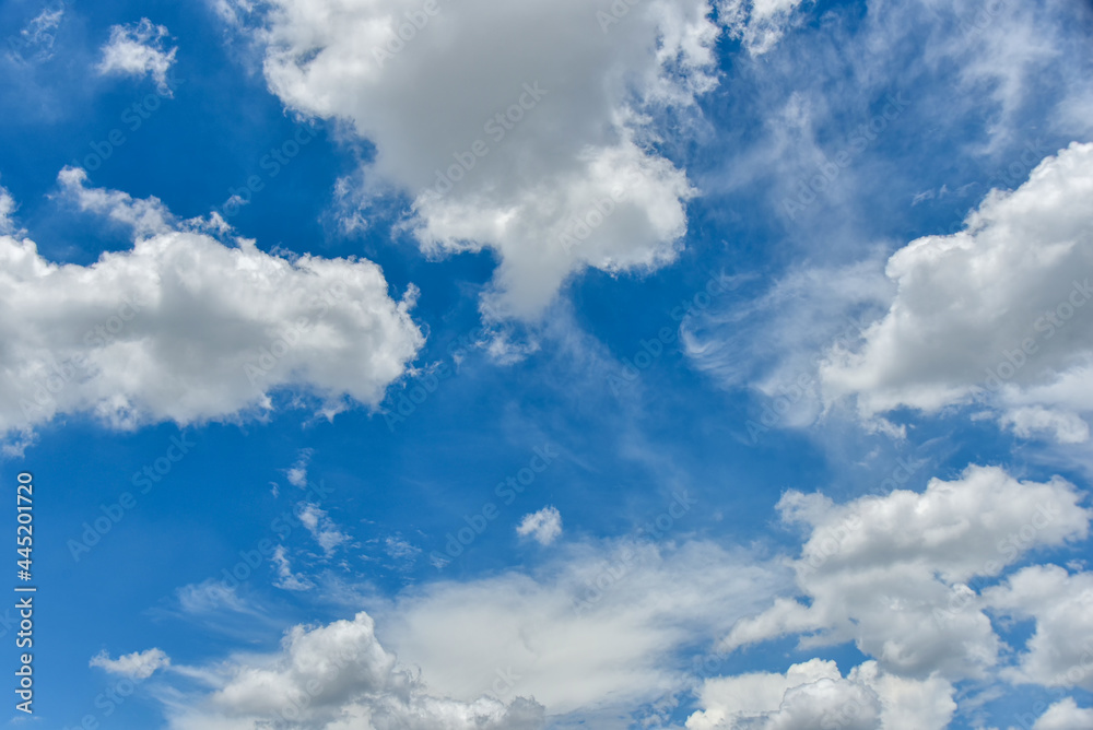 Beautiful cumulus clouds against the blue daytime sky. Beautiful cumulus clouds against the blue daytime sky.