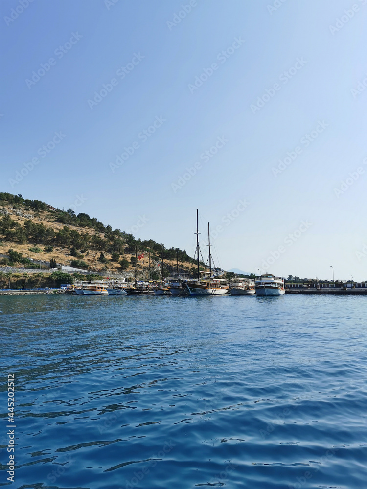 Seashore with boats in Turkey. Kusadasi