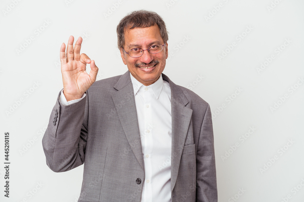 Middle aged indian business man isolated on white background cheerful and confident showing ok gesture. Middle aged indian business man isolated on white background cheerful and confident showing ok gesture.