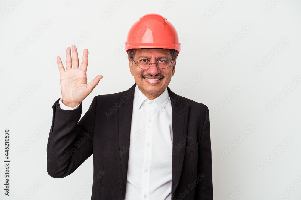 Middle aged indian architect man isolated on white background smiling cheerful showing number five with fingers. Middle aged indian architect man isolated on white background smiling cheerful showing number five with fingers.