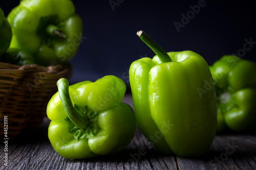 Raw fresh bell pepper on wo...