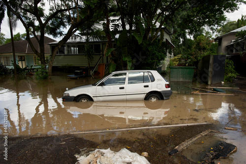 small car floating in a flooded street, 2011 Brisbane floods