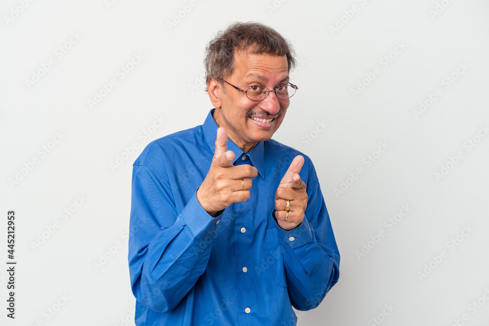 Middle aged indian man isolated on white background pointing to front with fingers. Middle aged indian man isolated on white background pointing to front with fingers.