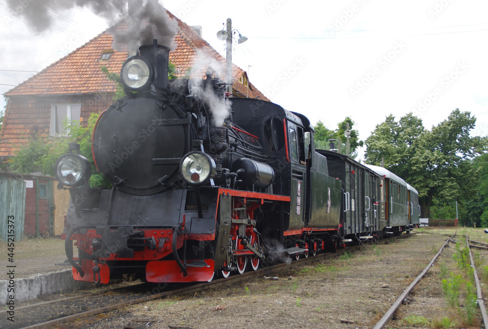 Fototapeta premium Old steam locomotive move on the rail