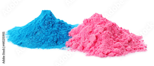 Colorful powder dyes on white background. Holi festival photo