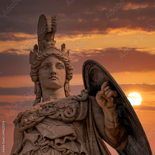 Athena ancient Greek goddess statue and impressive sundown sky