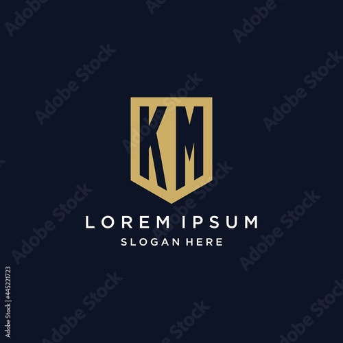 KM monogram initials logo design with shield icon