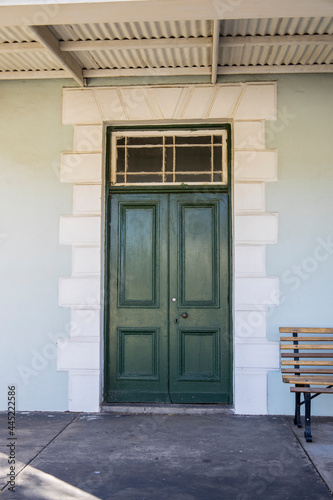 A vintage style door set in the wall of an old house in Worcester, South Africa