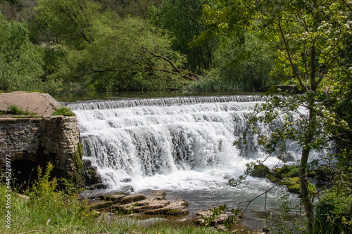 Monsal Dale Weir waterfall in Derbyshire, UK