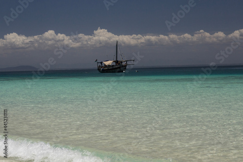 boat on a pristine beach photo