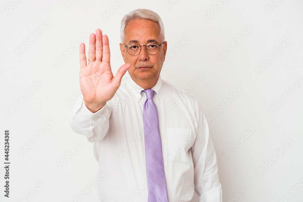 Senior american man isolated on white background standing with outstretched hand showing stop sign, preventing you. Senior american man isolated on white background standing with outstretched hand showing stop sign, preventing you.