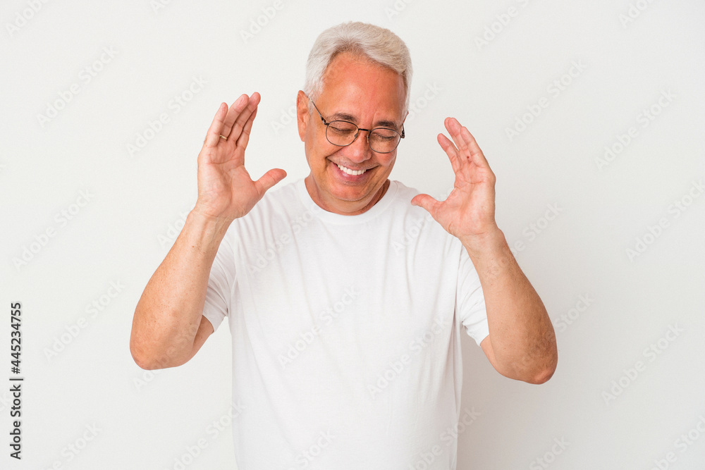 Senior american man isolated on white background joyful laughing a lot. Happiness concept. Senior american man isolated on white background joyful laughing a lot. Happiness concept.