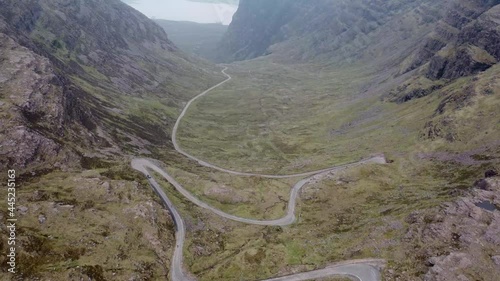 4k drone footage of the narrow winding mountain road at Bealach na Ba near Applecross in the Scottish Highlands, UK photo