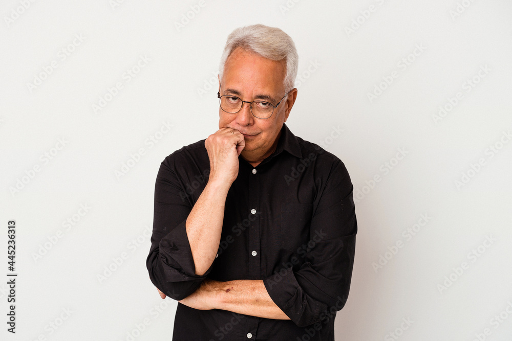 Senior american man isolated on white background who feels sad and pensive, looking at copy space. Senior american man isolated on white background who feels sad and pensive, looking at copy space.