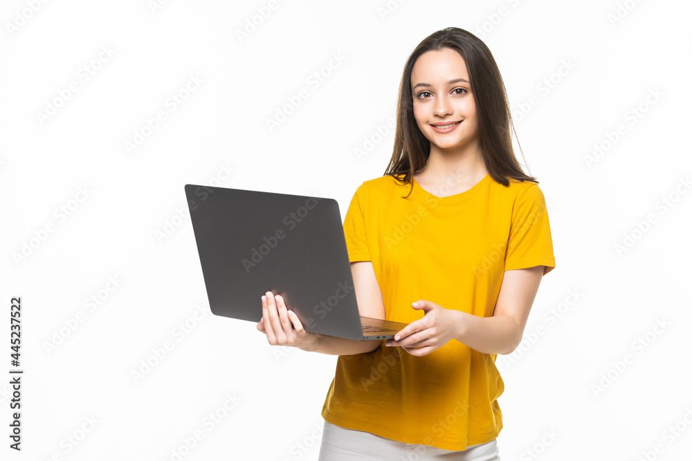 Young smiling business lady with a laptop. Isolated on white background. Young smiling business lady with a laptop. Isolated on white background.