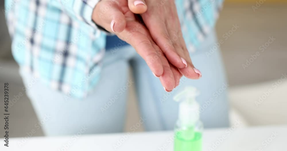 Woman applying antiseptic on hands 4k movie Woman applying antiseptic on hands 4k movie