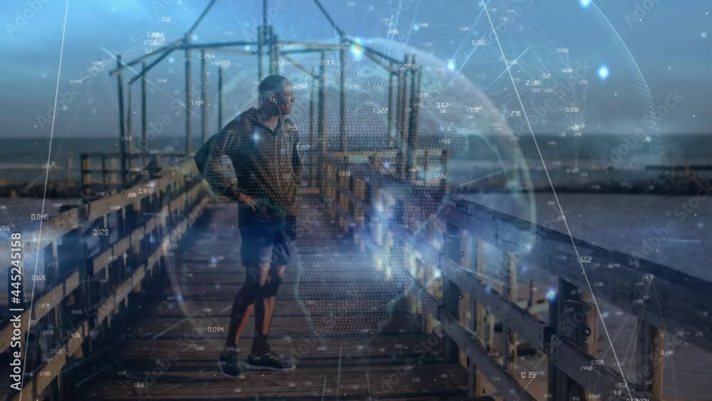 Animation of globe and data processing over fit man resting by seaside Animation of globe and data processing over fit man resting by seaside