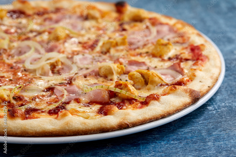 pizza on the wooden background