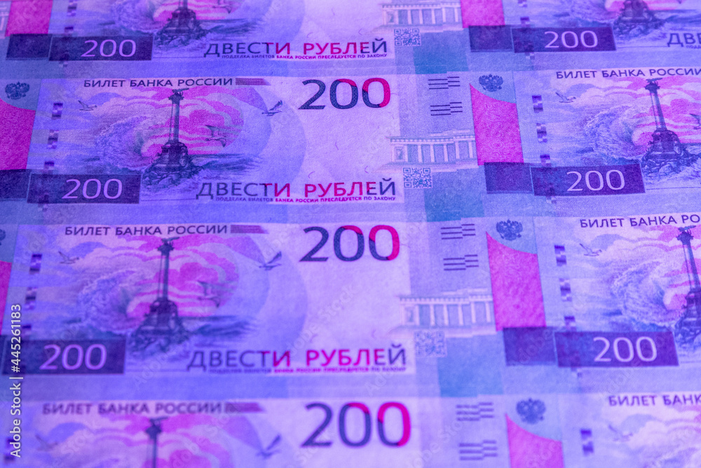 Fototapeta premium Russian money under ultraviolet light.