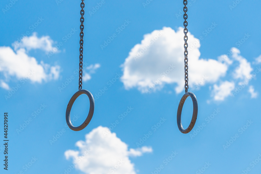 Sports rings on chains in the park. Sports rings on chains in the park.