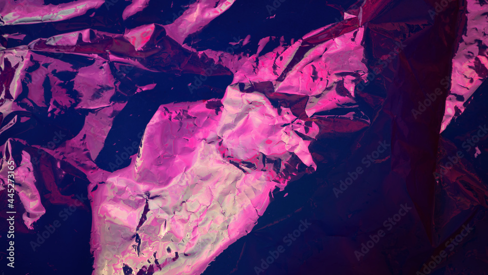 holographic dark purple background. Crumpled iridescent foil real texture. Synthwave. Vaporwave style. Retrowave, retro futurism