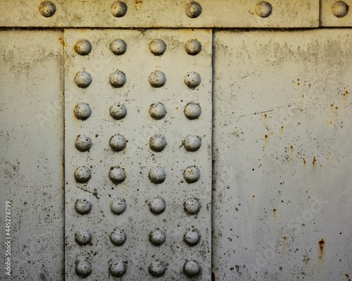 Close up of a rusty, iron bridge