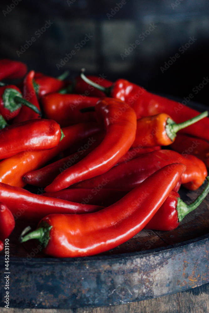 a pile of fresh red Hungarian goat horn chili peppers 